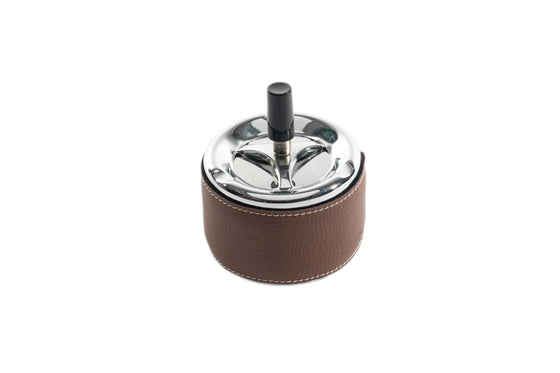 Indoor ashtray with button