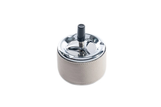 Indoor ashtray with button