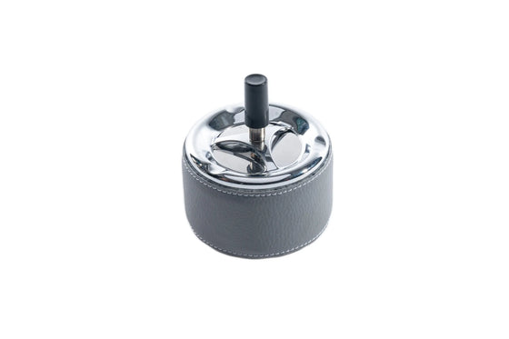 Indoor ashtray with button